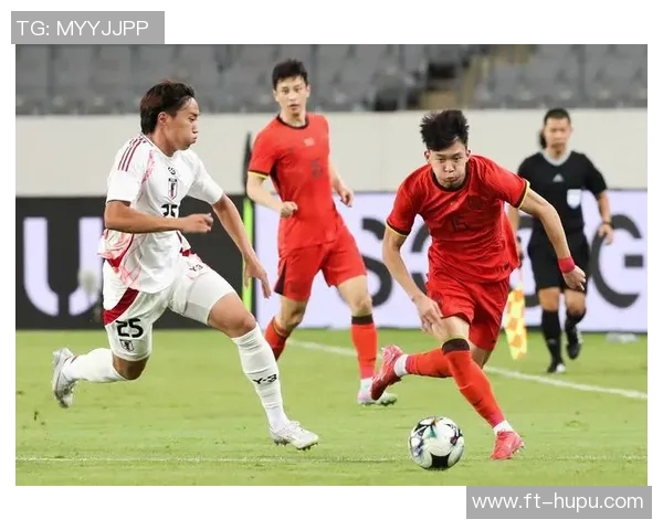 东亚杯激战再燃：中国队惜败日本，张玉宁遗憾错失单刀良机，王钰栋伤退令人惋惜